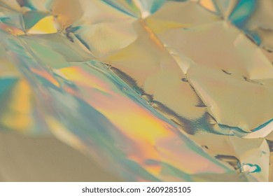 An abstract, vibrant image with reflective kaleidoscopic patterns, suggestive of modernity or luxury a