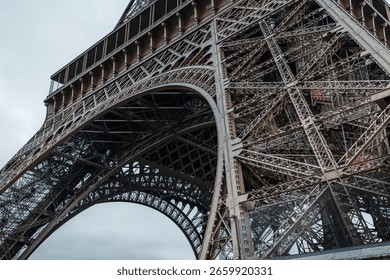 An abstract view of the arches on the Eiffel tower