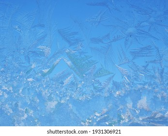 Abstract View Of Frost On The Window Surface. Blue Crystal Frosty Texture. Cold Winter Background.