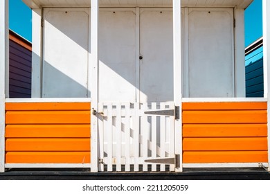 Abstract View Of A Newly Painted Orange Beach Hut Located At A Famous Beach On The Suffolk Coast In The UK.