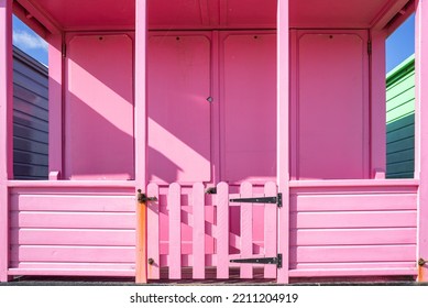 Abstract View Of A Newly Painted Pink Beach Hut Located At A Famous Beach On The Suffolk Coast In The UK.