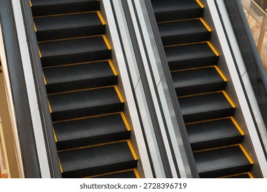 Abstract View of Parallel Escalators Representing Movement and Progress