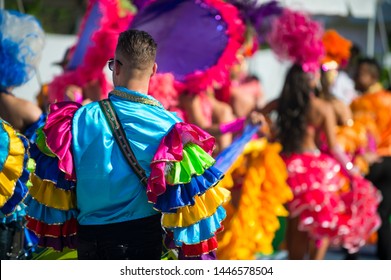 Abstract View Of Samba Dancers In Colorful Frilled Costumes At A Daytime Carnival Street Party In Rio De Janeiro, Brazil