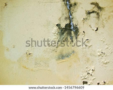 Abstract view of a wall with peeliing paint and space for text.