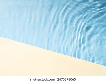 Abstract view of waves in the water near a swimming pool with shadows and a yellow background. Mockup concept for showcasing a summer product or advertisement. Top view and copy space. - Powered by Shutterstock