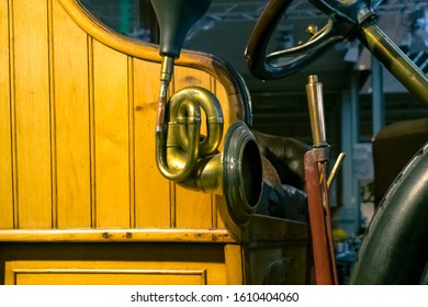 Abstract Vintage Industry Or Steampunk Background Featuring Detail Of Vintage Retro Museum Car Steering Wheel, Gear Lever, Signal Horn And Front Compartment.