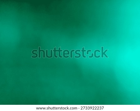 Abstract visual composition featuring a dominant, rich, dark emerald green field blending softly toward a brighter cyan glow on the right side, creating depth.