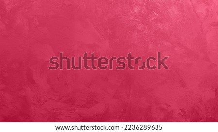 Abstract viva magenta painted texture as background with copy space. Shiny pattern in trendy color 2023 year Viva Magenta. Vintage blank backdrop