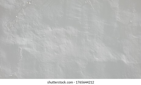 Abstract Of The Wall Painted In White. It Looks Like A Slightly Wrinkled Paper.