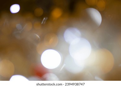 abstract warm bokeh light background from Christmas decorative light - Shutterstock ID 2394938747
