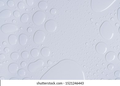 Abstract Water Drops After Rain On The Glossy Surface Of Outdoor White Table Texture Background Top View, Wallpaper.