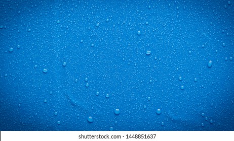 abstract water drops blue background - Shutterstock ID 1448851637