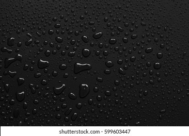 abstract water drops on a white background - Shutterstock ID 599603447