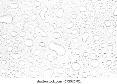abstract water drops on a white background - Shutterstock ID 673076701