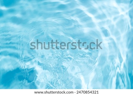 Abstract water ripple background surface. Top view green blue turquois water swirl wave with ripples nice lightling, pastel water splashing zen pond background photo nice pattern