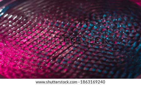 Abstract water ripple pattern created by soundwave with cyber punk light