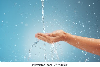 Abstract Water, Splash And Woman Cleaning Hands . Clean Flow Eco Friendly Healthy, Sustainable Waterfall Environment And Earth Day Fresh Cold Wet Hand Under Water With Blue Background In Studio