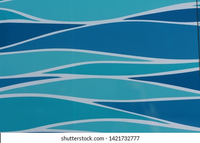 Abstract wavy pattern with dark and light blue colors