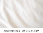 Abstract White Bedding Sheets or White wrinkled fabric background texture and Texture with copy-space :Creased or wrinkled white fabric,Soft focus