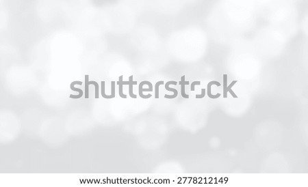 Abstract white bokeh background with soft focus and blurred light effect. Elegant and modern design for various creative projects.