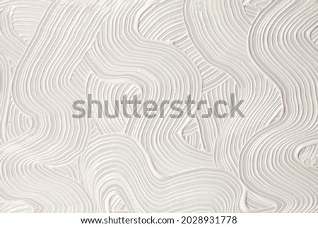 Abstract white color acrylic wave wall painting. Canvas vintage grunge texture horizontal background.