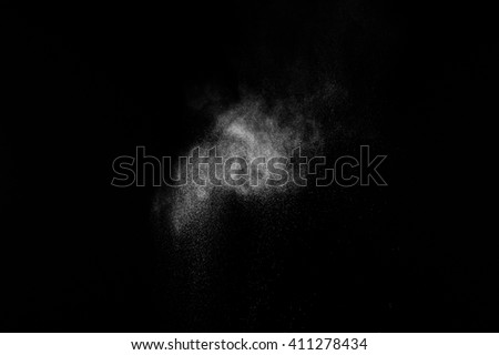 abstract white dust explosion  on  black background. 