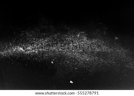 abstract white dust on a black background.