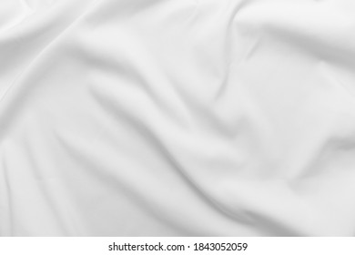 Abstract white fabric texture background. Cloth soft wave. Creases of satin, silk, and cotton. - Powered by Shutterstock