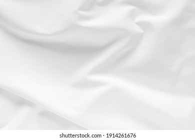 Abstract White Fabric Texture Background. Cloth Soft Wave. Creases Of Satin, Silk, And Cotton.