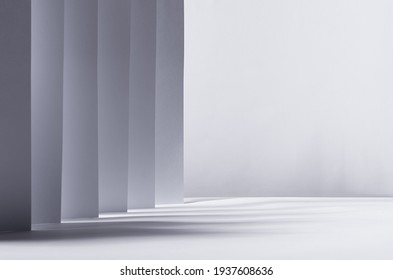 Abstract white grey background with contrast perspective of stripes, light and shadow and copy space like street, city, scene.