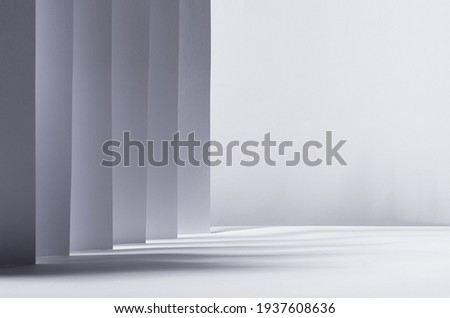 Abstract white grey background with contrast perspective of stripes, light and shadow and copy space like street, city, scene.