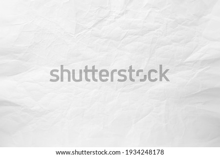 Abstract white paper wrinkled or crumpled texture background , top view , flat lay.