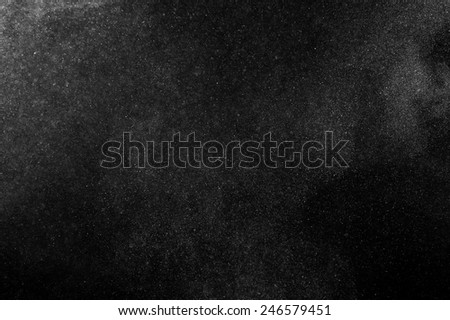 abstract white powder explosion  on black background