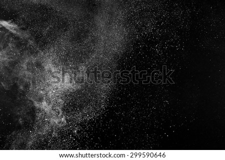 abstract white powder explosion  on a black background