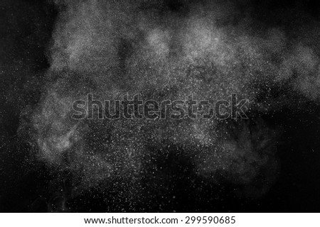 abstract white powder explosion  on a black background