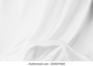 Abstract White Satin Silky Cloth for background, Fabric Textile Drape with Crease Wavy Folds.with soft waves,waving in the wind.