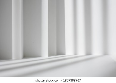 Abstract white studio background for product presentation. Empty gray room with shadows of window. Display product with blurred backdrop. - Shutterstock ID 1987399967