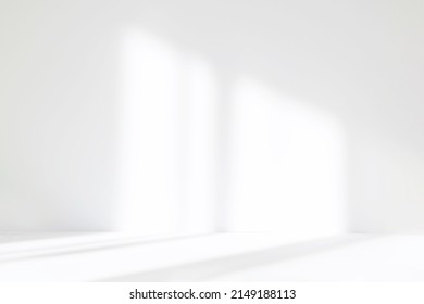 Abstract white studio background for product presentation  Empty room and shadows window  Display product and blurred backdrop 