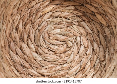 Abstract Wicker Seagrass Basket Texture Background. Circle Spiral Pattern. Bottom Of Natural Home Storage Basket. Close-up, Circle Spiral Pattern