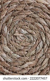 Abstract Wicker Seagrass Basket Texture Background. Circle Spiral Pattern. Bottom Of Natural Home Storage Basket. Close Up, Circle Spiral Pattern