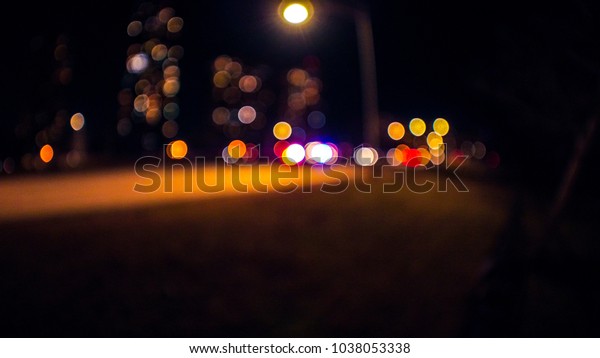 Abstract wide angle background photograph of out
of focus lights from an accident scene with fire trucks, ambulance
and cop cars and high rise buildings beyond on lake shore drive in
Chicago.