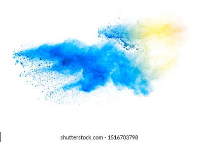 Abstract Yellow Blue Dust Explosion On White Background. Freeze Motion Of Yellow Blue Powder Splash.