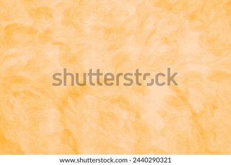 Abstract yellow color toned painted congrete wall texture as background.