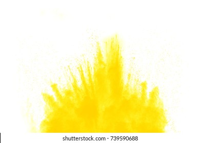 abstract yellow powder explosion on  black background.