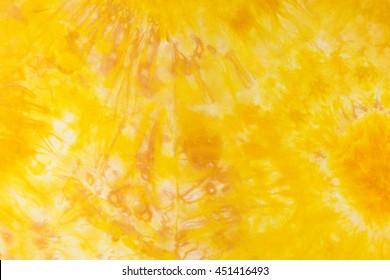 Abstract Yellow Tie Dye Pattern On Silk Fabric