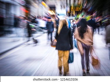 Abstract Zoom Blurred Shoppers On Busy Retail High Street