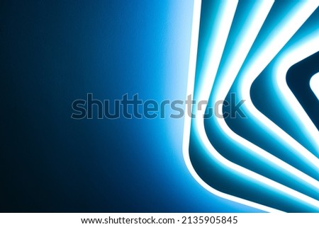 Abstraction, banner background. Blue bright light from a multi-level LED lamp.