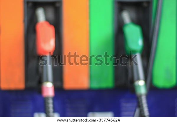 Abstraction\
blur from Fuel Pumps at the Petrol\
Station