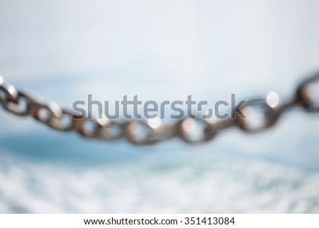 Abstraction blurred from chain on sea background