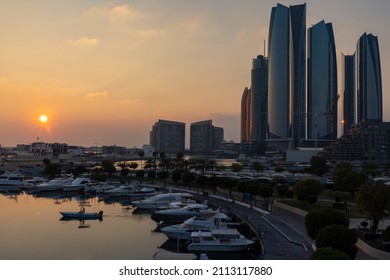 Abu Dhabi skyline and waterfront at sunset